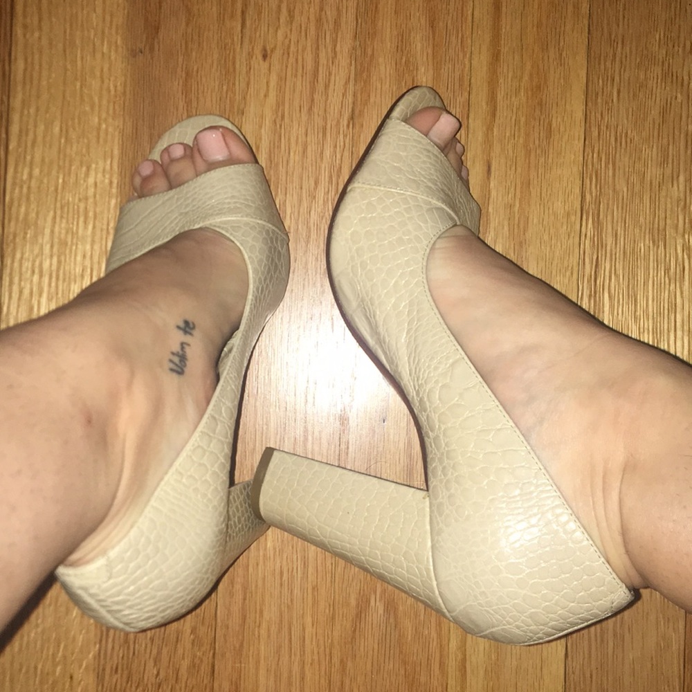 Nude snakeskin heels